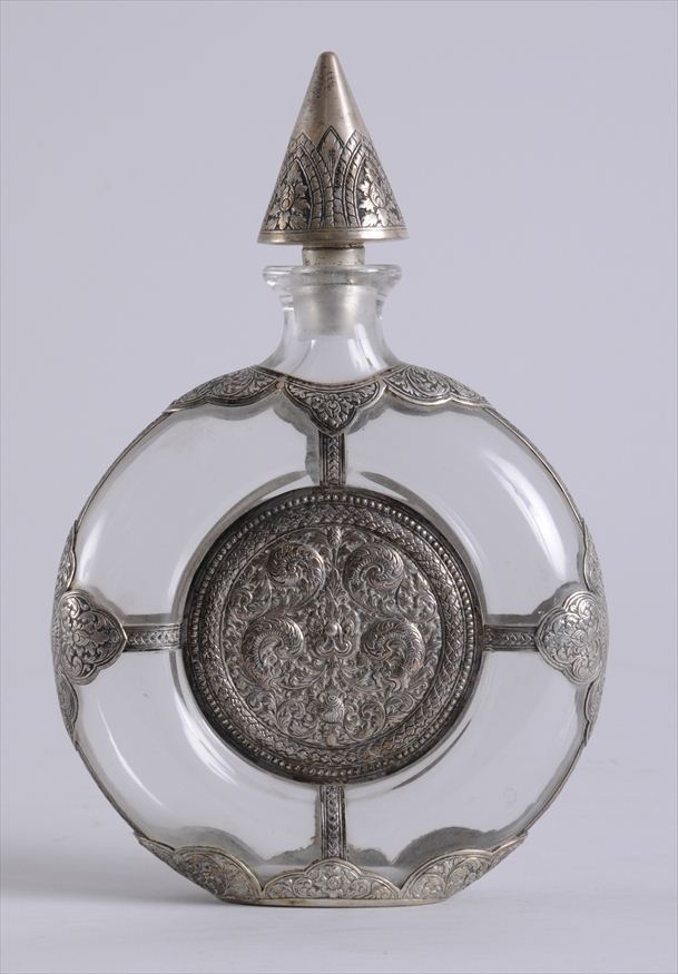 TIBETAN SILVER-MOUNTED GLASS MOON