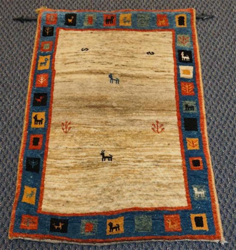 TIBETAN WOOL ANIMAL RUG, 4 FT X 2