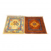 TIBETAN WOOL RUG A pair of Tib