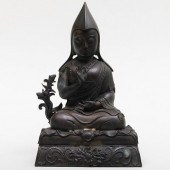 TIBETO-CHINESE BRONZE FIGURE O