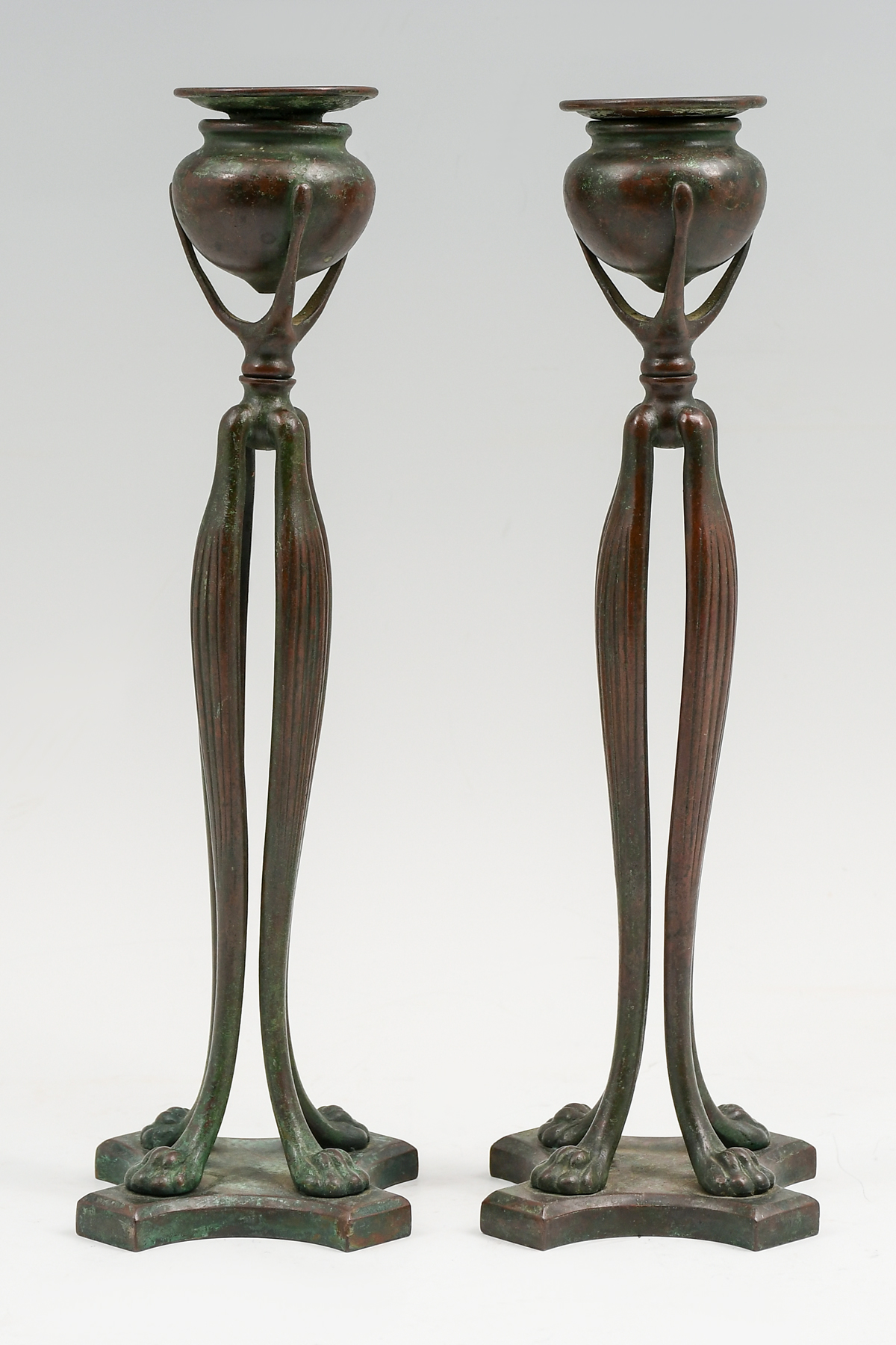 TIFFANY BRONZE CANDLESTICKS: A pair