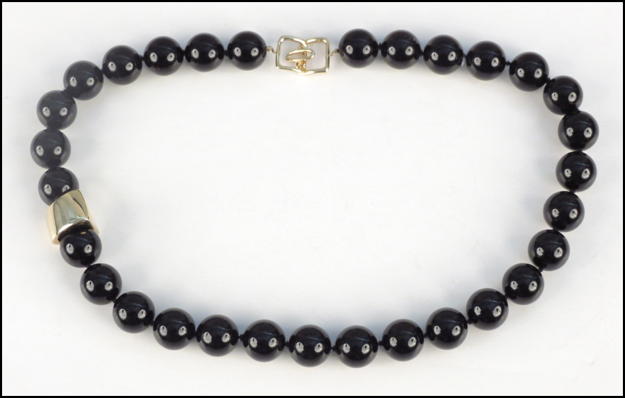 TIFFANY & COMPANY ONYX AND 18 KARAT