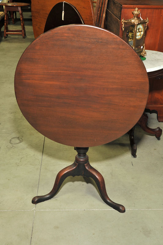 TILT TOP TEA TABLE. Walnut with a
