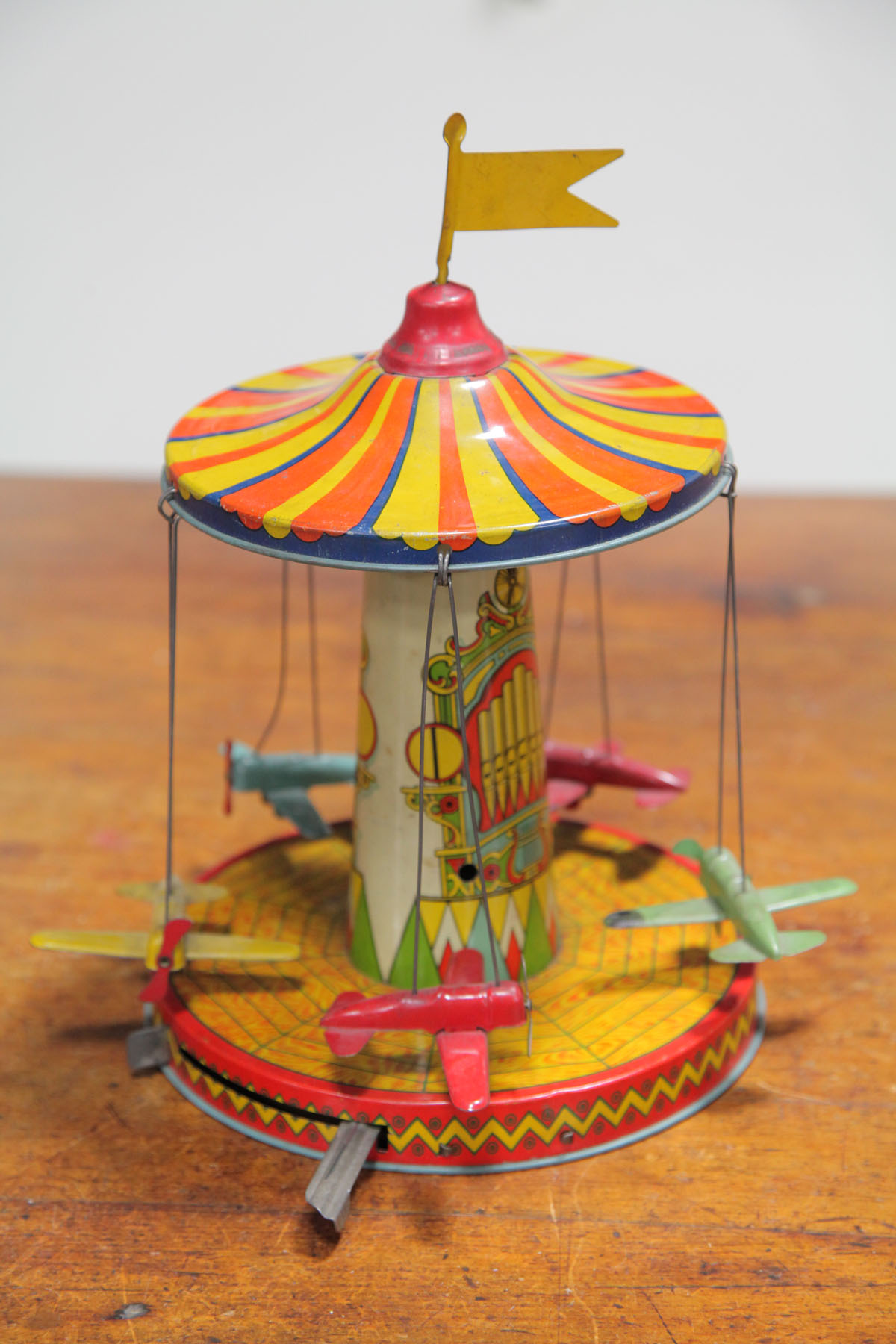 TIN AIRPLANE CAROUSEL WIND-UP. 