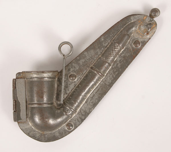 Tin candy mold marked Anton Reiche,