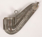Tin candy mold marked Anton Re