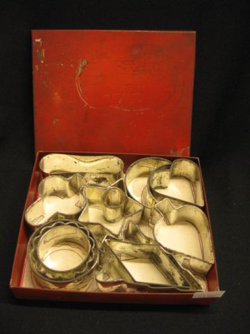 Tin Cookie Cutters in tin box.