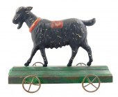 TIN GOAT ON WHEELS TOY, 19TH C