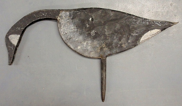 Tin over wood silhouette of a