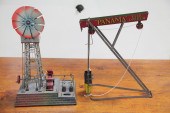 TIN PILE DRIVER AND OIL DERRIC