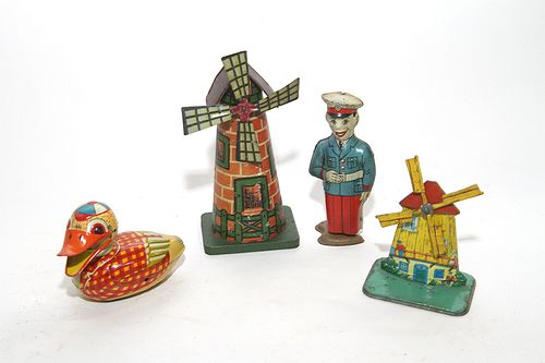 TIN TOY LOTA four piece lot in