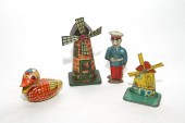 TIN TOY LOTA four piece lot in