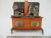 TIN TOY STOVE WITH VARIOUS POT
