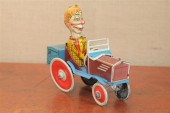 TIN WIND UP TOY. A lithographe