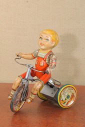 TIN WIND UP TOY. ''Kiddy Cycli