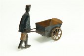 TIN WIND UP TOY.  Strauss  New