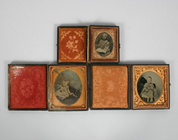 Tintypes of three young children;