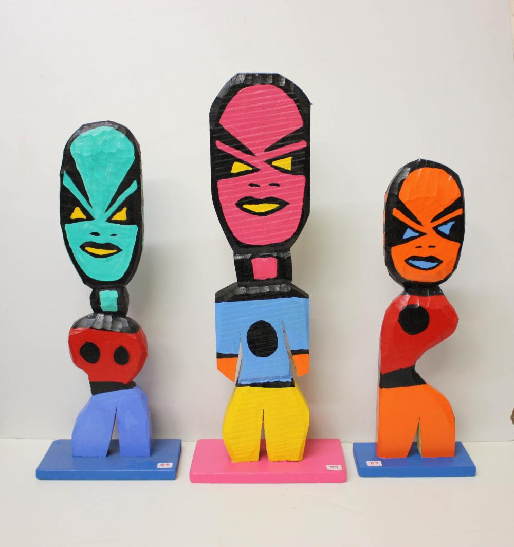 TOM CRAMER THREE CARVED AND PAINTED
