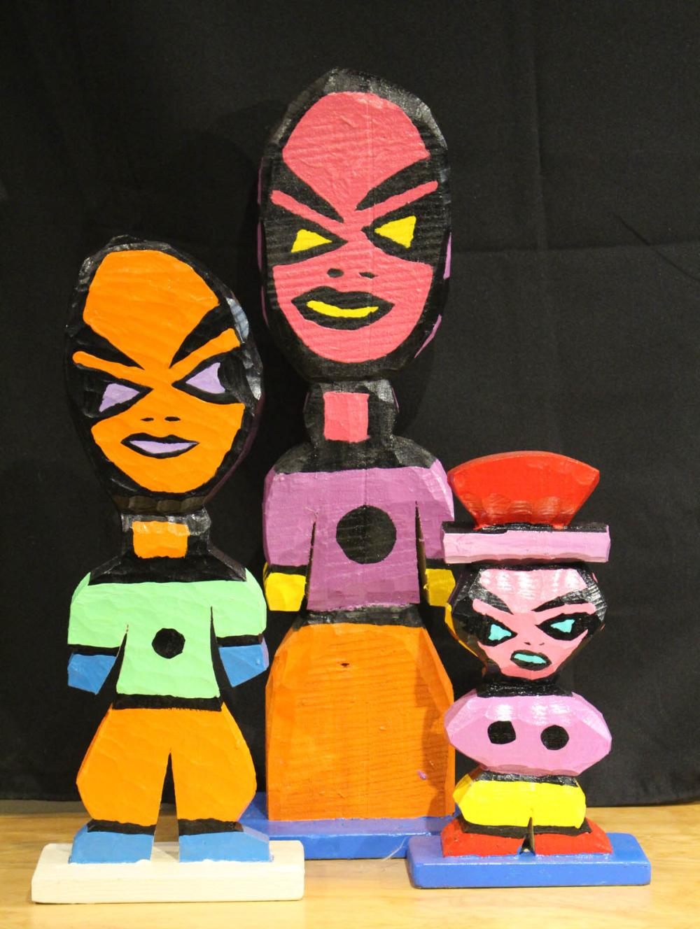 TOM CRAMER THREE CARVED AND PAINTED