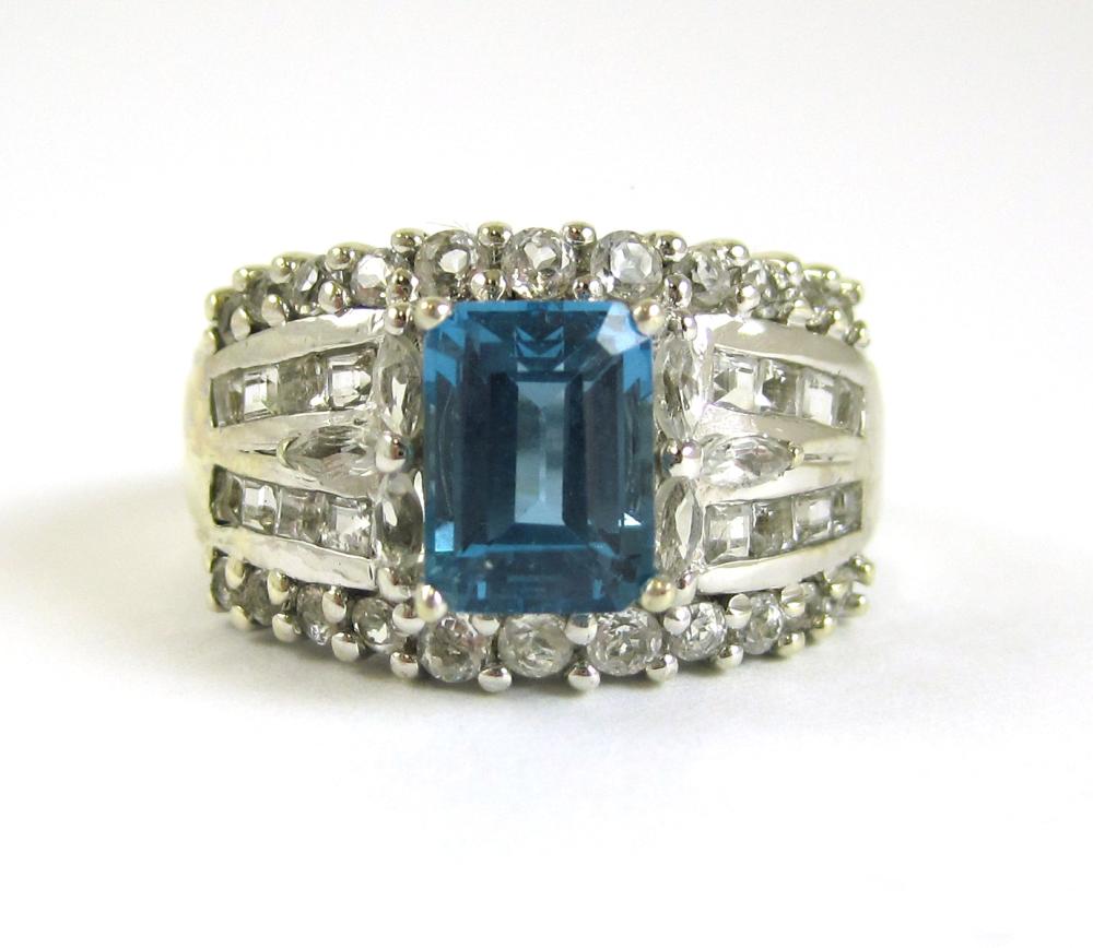 TOPAZ, AND TEN KARAT GOLD RING, THE