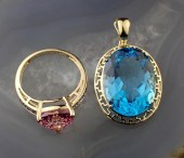 TOPAZ AND YELLOW GOLD RING AND