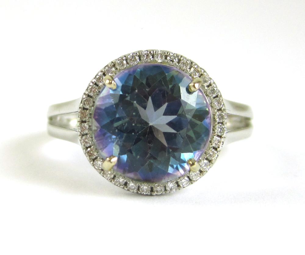 TOPAZ, DIAMOND AND FOURTEEN KARAT