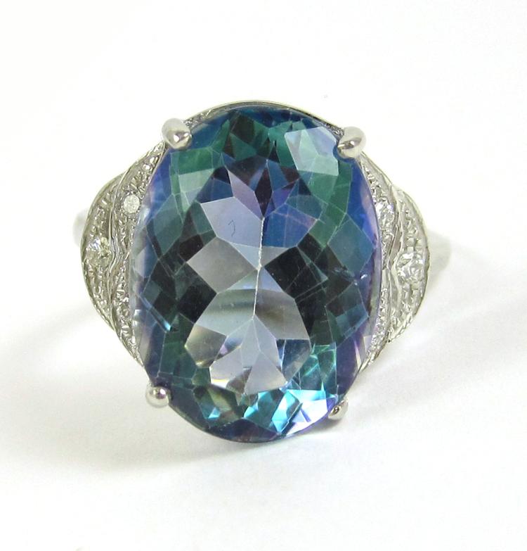 TOPAZ, DIAMOND AND FOURTEEN KARAT