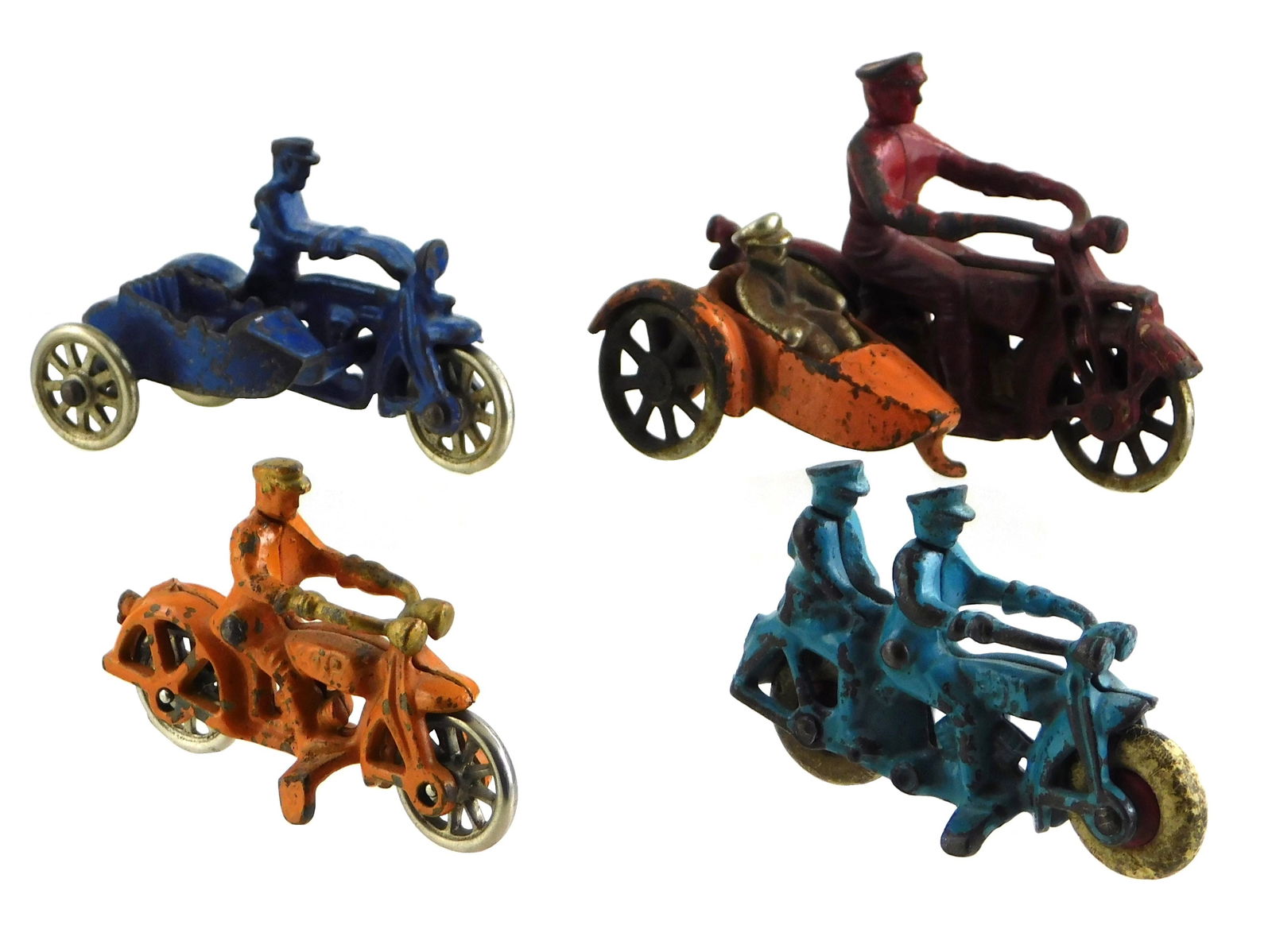 TOYS: FOUR HUBLEY PAINTED CAST IRON