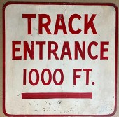 TRACK ENTRANCE 1000 FEET SIGN,