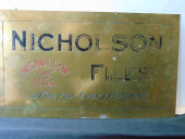 TRADE SIGN STAMPED BRASS "NICH