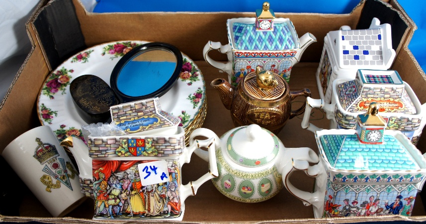 Tray comprising Various Teapots