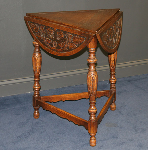 Tri-fold carved table; floral