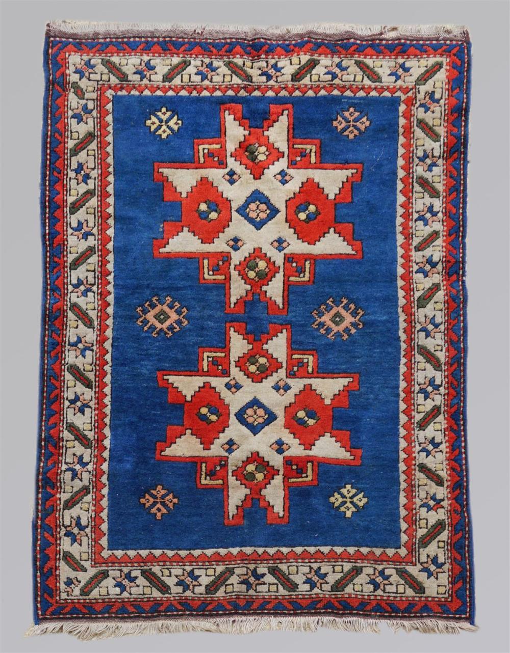 TRIBAL BLUE AND RUST WOOL RUGTRIBAL