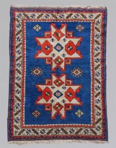 TRIBAL BLUE AND RUST WOOL RUGT