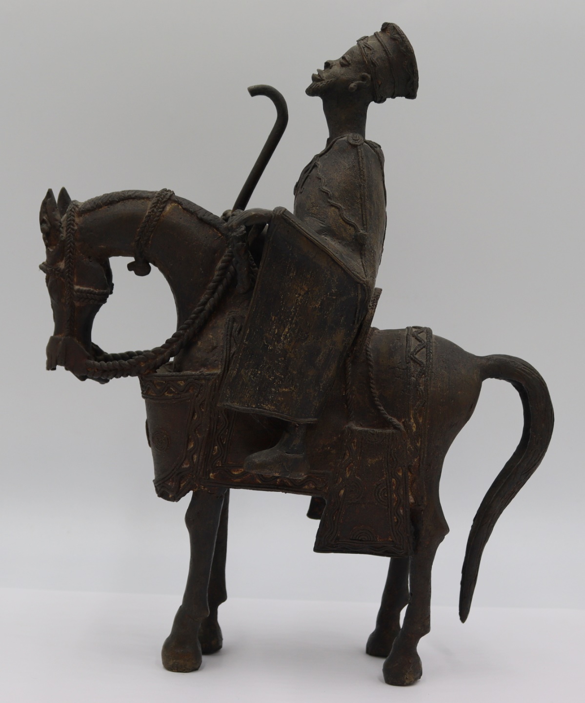 TRIBAL BRONZE HORSE AND RIDER.