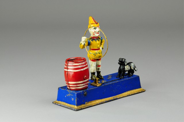 TRICK DOG MECHANICAL BANK (YELLOW