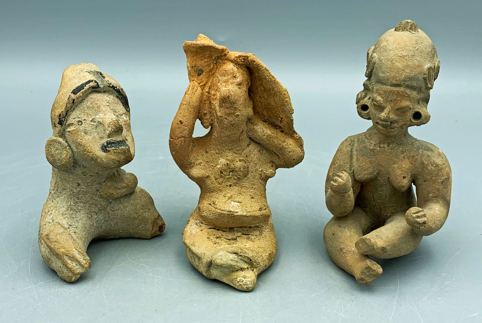 TRIO OF PRE-COLUMBIAN FIGURESA trio