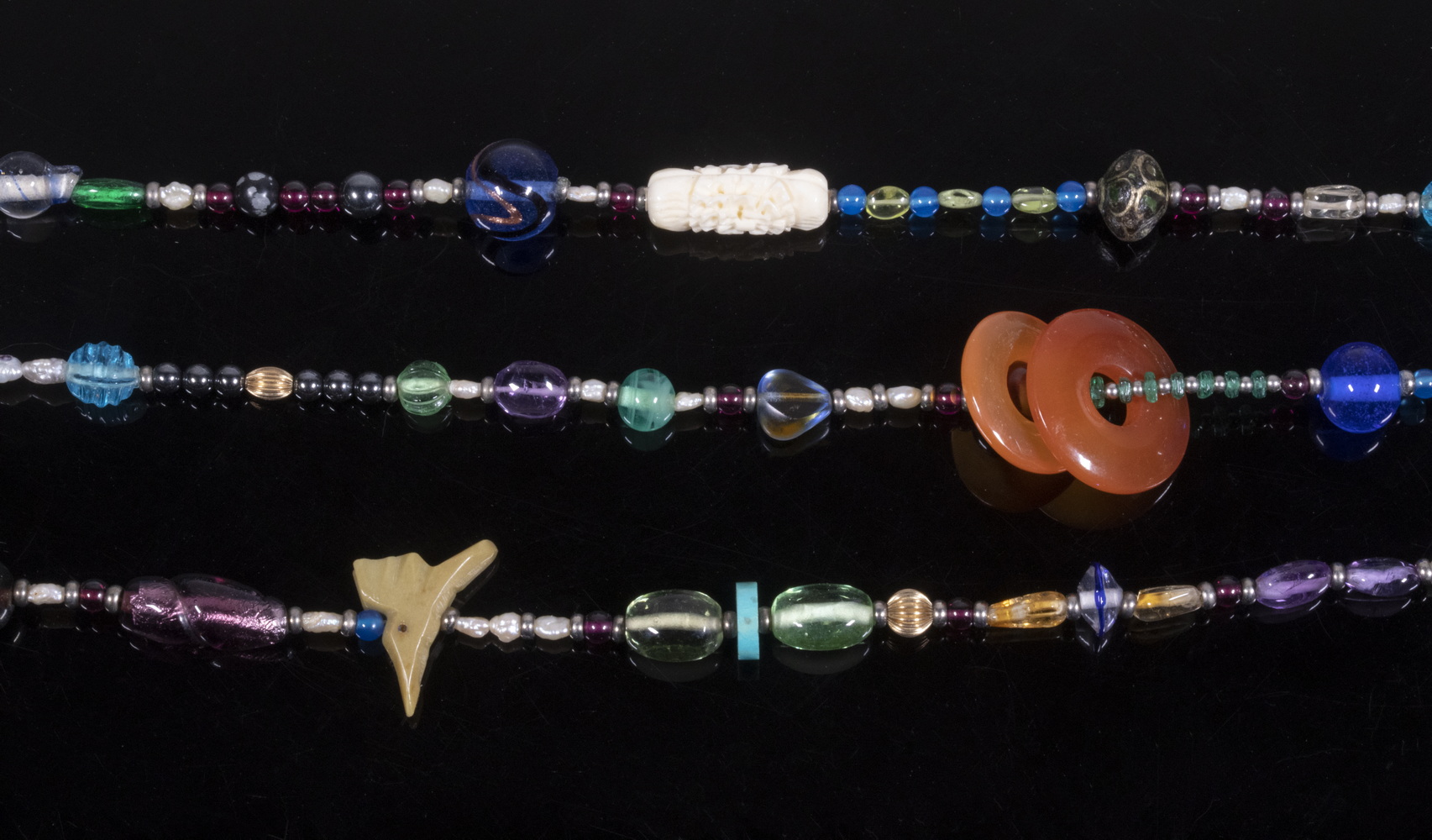 TRIPLE STRAND BEADED NECKLACE