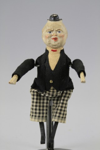 TUMBLING MAN TOY Composition head