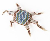 TURTLE SHAPED NAVEL AMULET OR