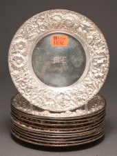 Twelve American repousse silve