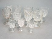 TWELVE ASSORTED MOLDED GLASS G