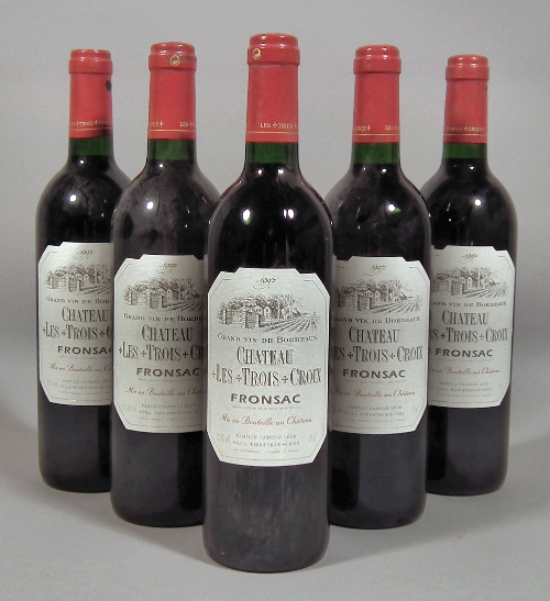Twelve bottles of mixed red