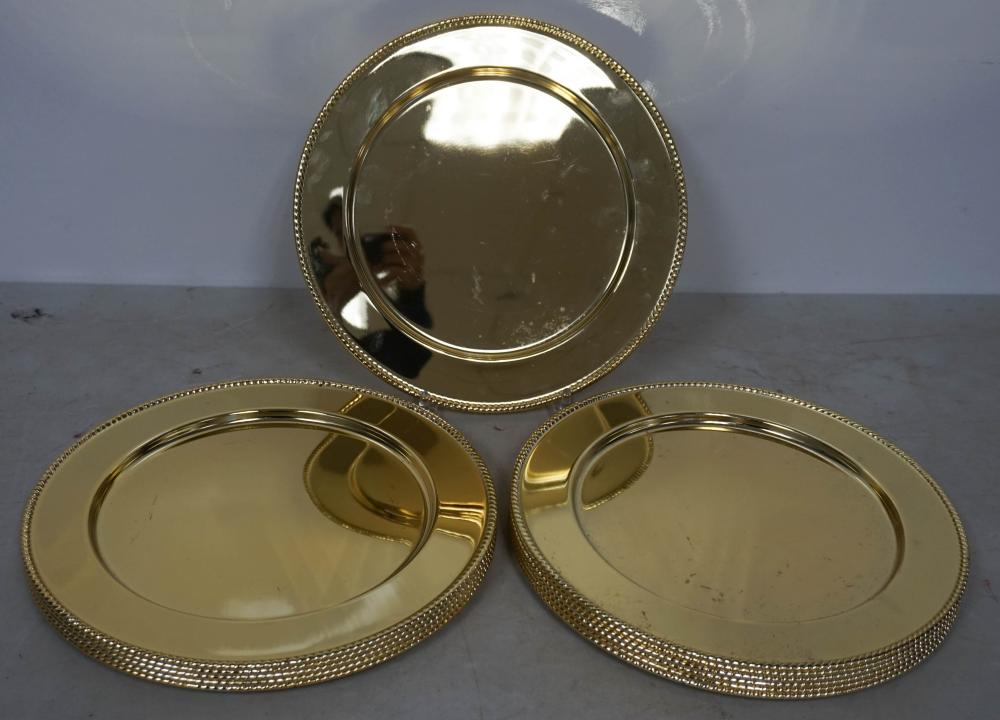 TWELVE BRASS SERVICE PLATES D: 11