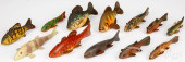 TWELVE CARVED AND PAINTED SPEA