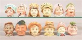 TWELVE CERAMIC FIGURAL BUST ST