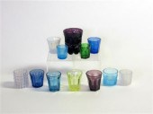 Twelve colored glass items