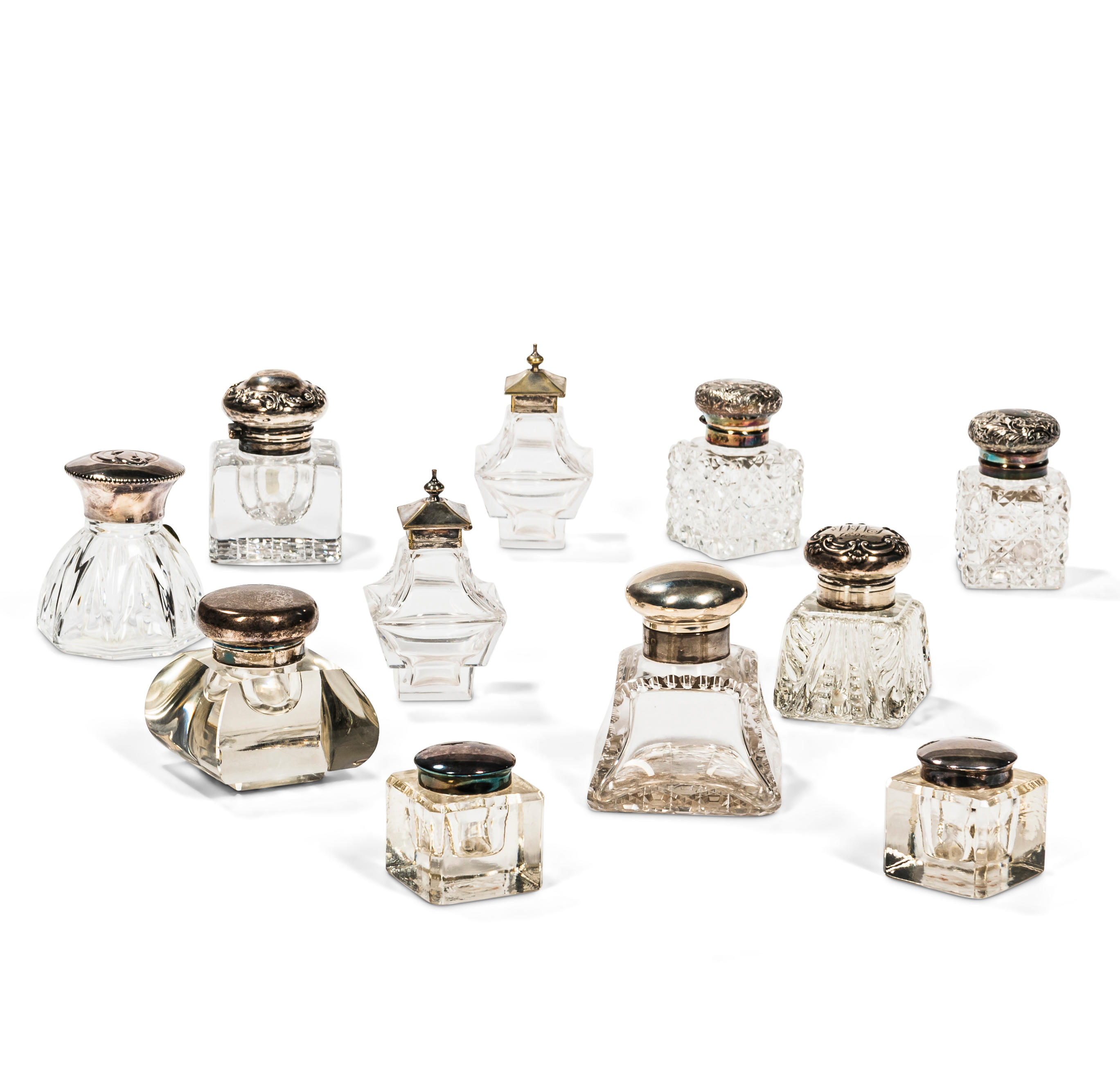 TWELVE COLORLESS GLASS INKWELLS All