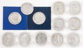 TWELVE COMMEMORATIVE SILVER HA