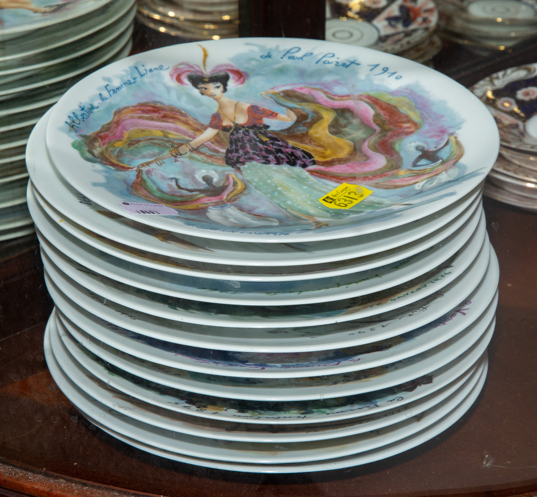 TWELVE D'ARCEAU-LIMOGES PLATES .